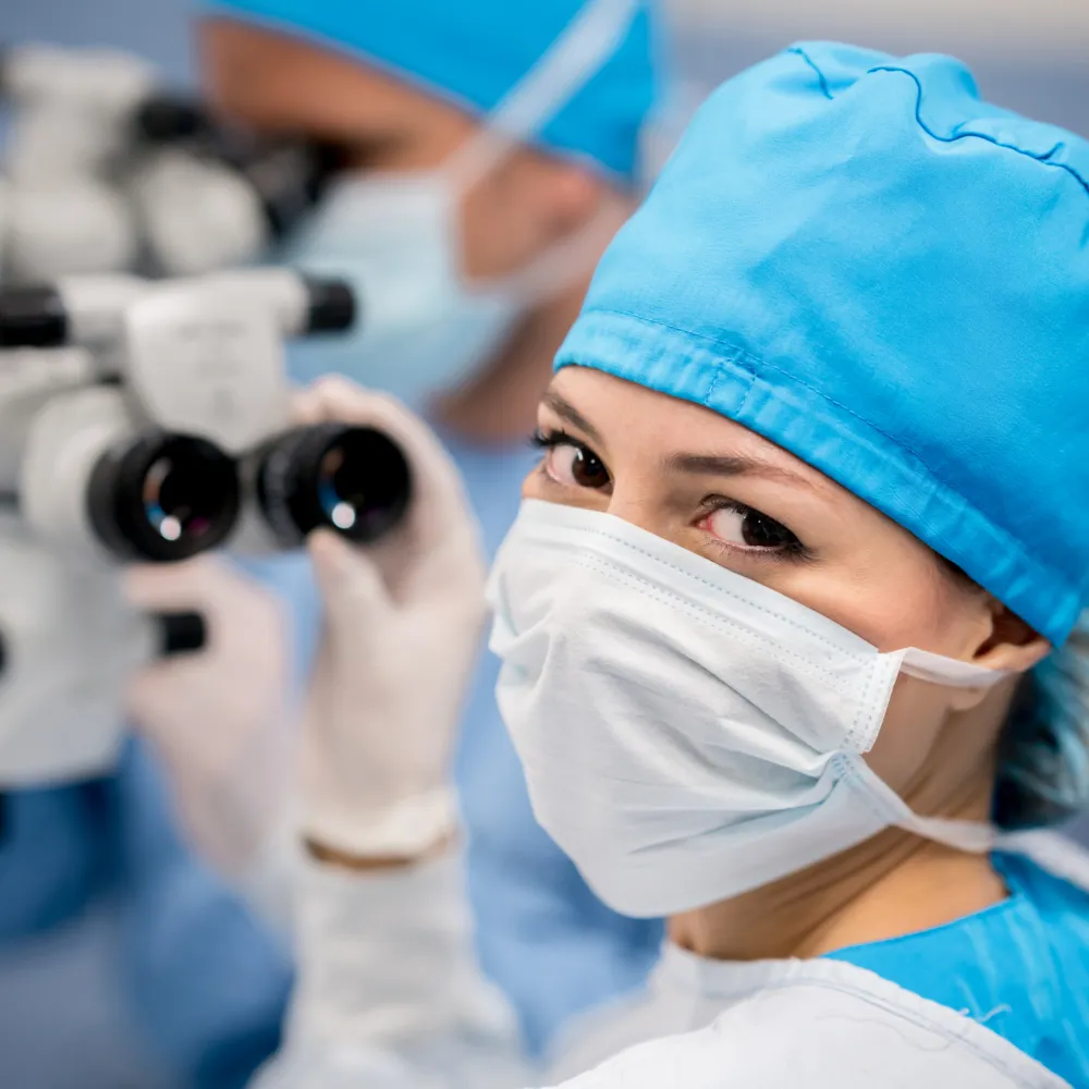 Ophthalmologist in surgery.
