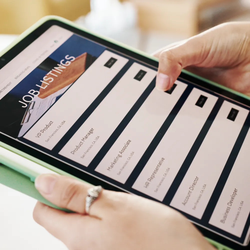 Tablet being used to search classifieds.
